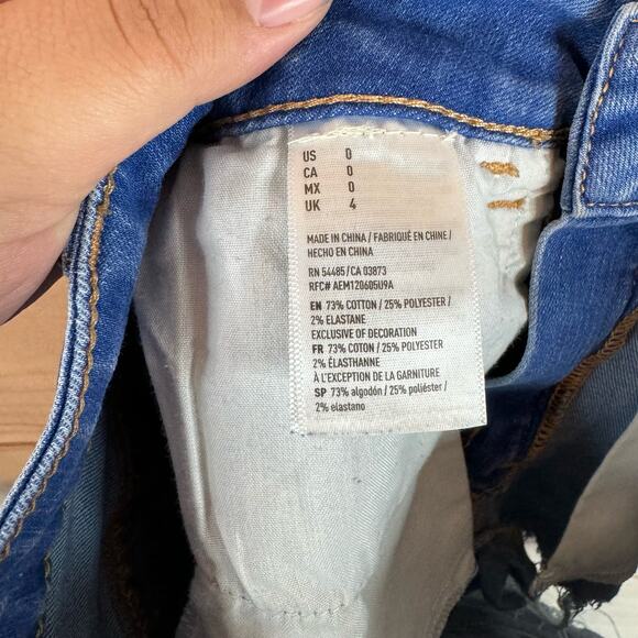 American Eagle Outfitters Medium Wash Super Stretch Cut Off Shorts Size 0 - Picture 4 of 4